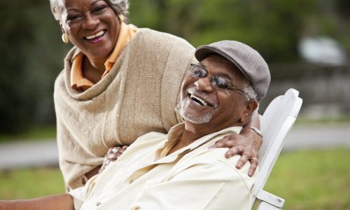 Portrait of stylish senior African American couple.  Focus on man (60s).